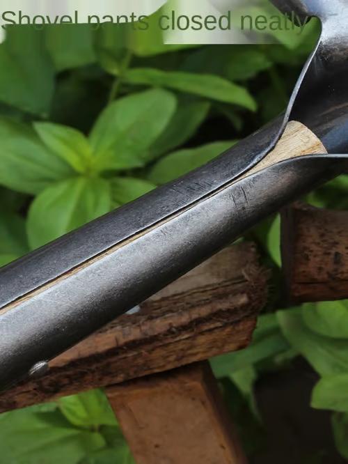 Sam's Accessories metal and wood shovel